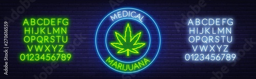 Medical marijuana neon sign. Neon alphabet on brick wall background. Template for design.