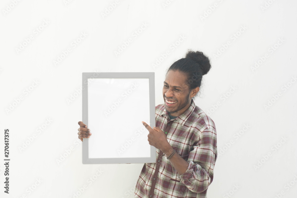 young black man holding white board with isolated background in white young black man holding white board with isolated background in white