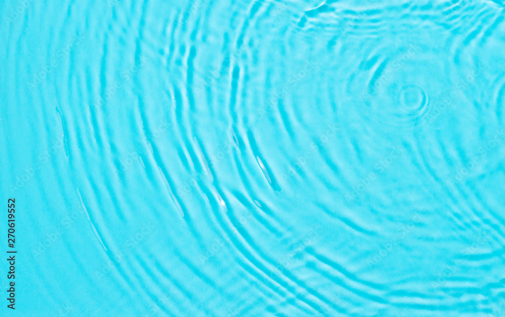 Blue water texture background on the noon sunlight. Blue water texture background on the noon sunlight.