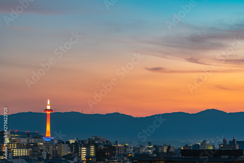 Colorful Kyoto Tower with Kyoto city skyline view at dusk in Japan