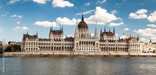 Building of the hungarian parliament in a Budapest, capital of Hungary, by the Danube river. One of the landmark of Budapest, and popular tourist destination. © Milan