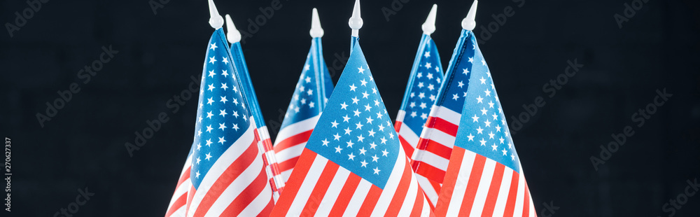 panoramic shot of national american flags isolated on black, Independence Day concept