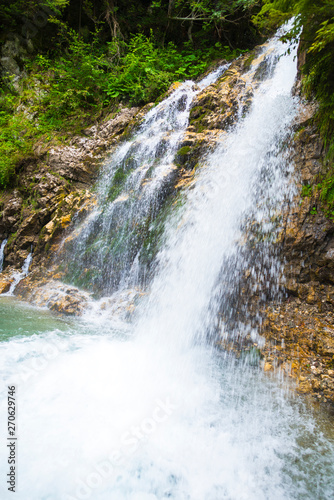 Amazing waterfall in Bucegi Mountaiuns, Urlatoarea waterfall © somra