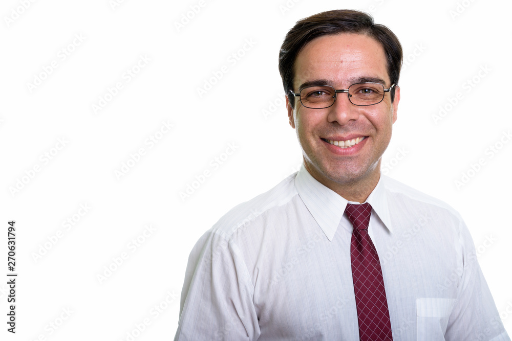 Close up of young happy Persian businessman smiling with eyeglas Close up of young happy Persian businessman smiling with eyeglas