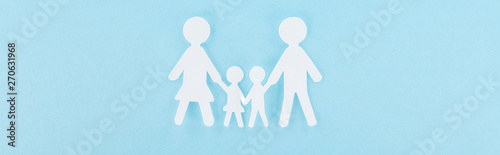 top view of white paper cut family on blue background  panoramic shot