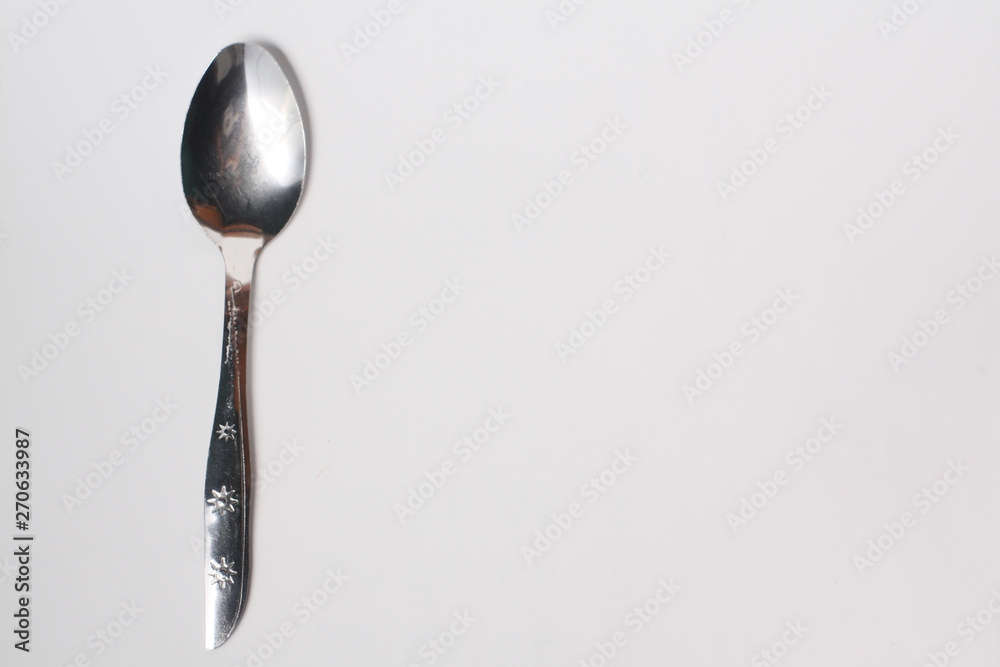 Cutlery , spoon and fork on white background