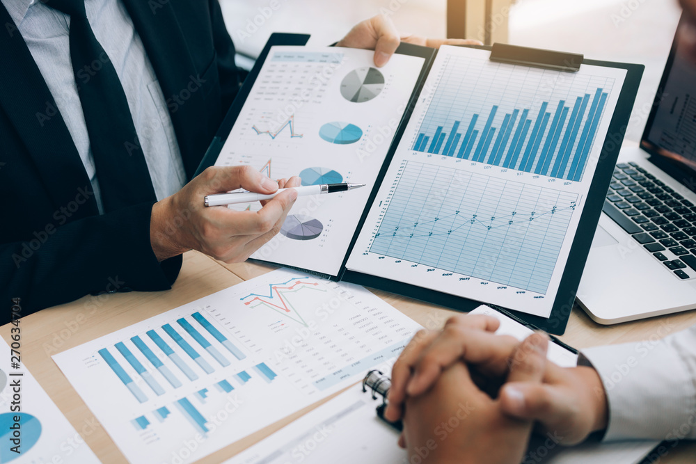 Business people discussing with colleagues with entrepreneurs are planning finance in office room. Business people discussing with colleagues with entrepreneurs are planning finance in office room.