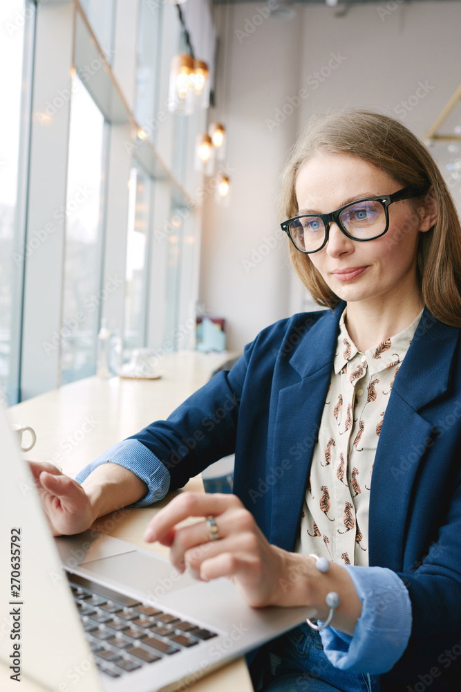 Businesswoman working from cafe Businesswoman working from cafe