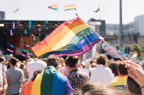 People With Rainbow Flags Attending a Gay pride