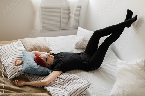 real modern woman relaxing at home photo