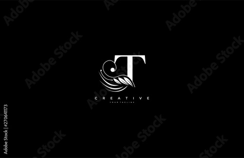 Initial T letter luxury beauty flourishes ornament monogram logo