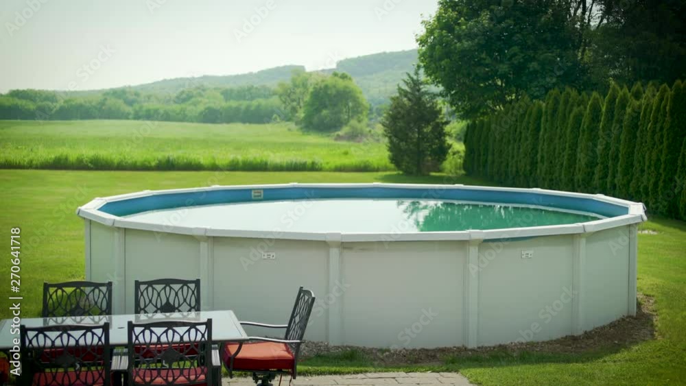 Rural backyard with above ground pool