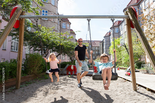 Kids on swing