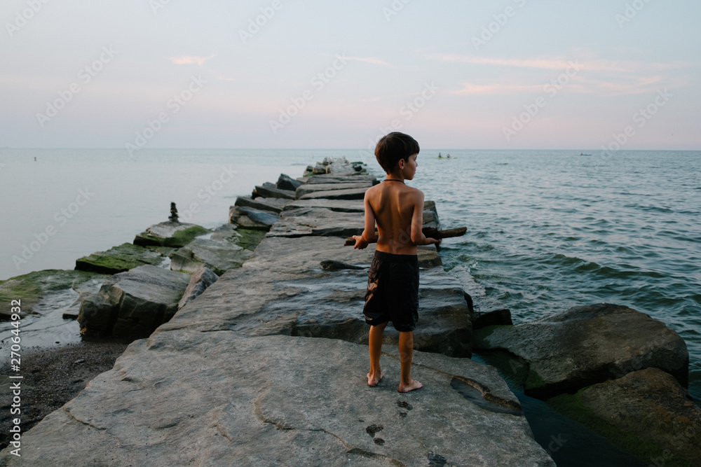 kids on the beach at sunset kids on the beach at sunset