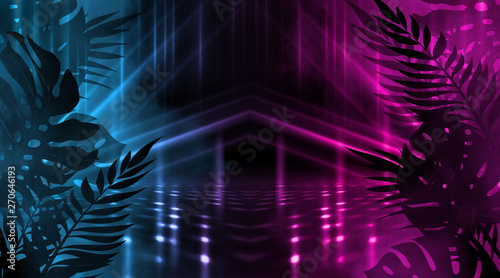 Background of empty dark scenes with neon lights and shapes, smoke. Silhouettes of tropical palm leaves in the foreground. Bright futuristic abstract background