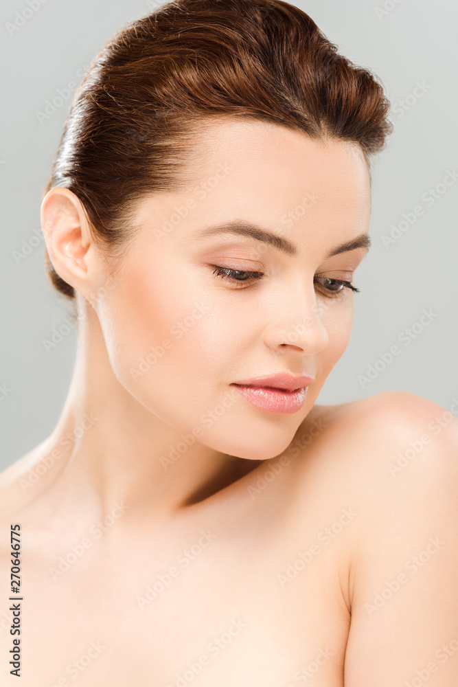pretty and naked woman with lip gloss on lips isolated on grey pretty and naked woman with lip gloss on lips isolated on grey