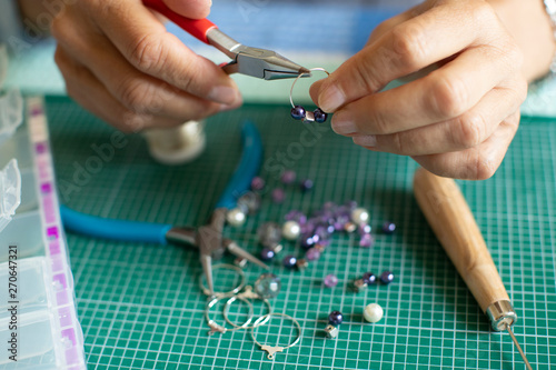 Photography Close Up Of Senior Woman Making Jewellery Earrings At Home