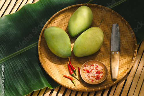 Fresh green mango with salt mix chili.