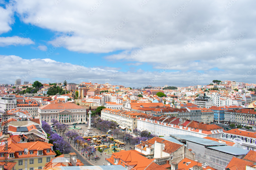 Aerial view on buildings and orange roofs in Lisbon, Portugal. View from Above on city and architecture