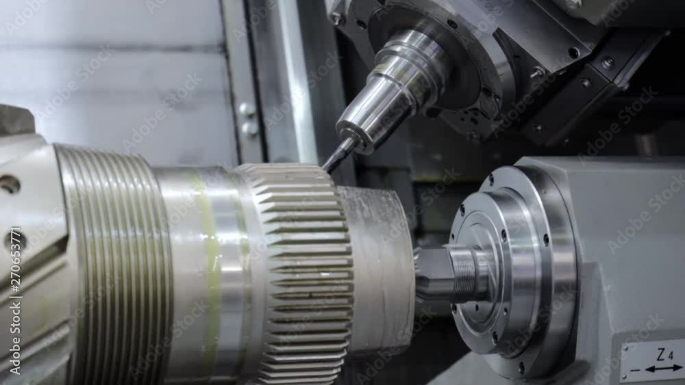 Metalworking CNC lathe milling machine. Cutting metal modern processing technology. Metalworking CNC lathe milling machine. Cutting metal modern processing technology.