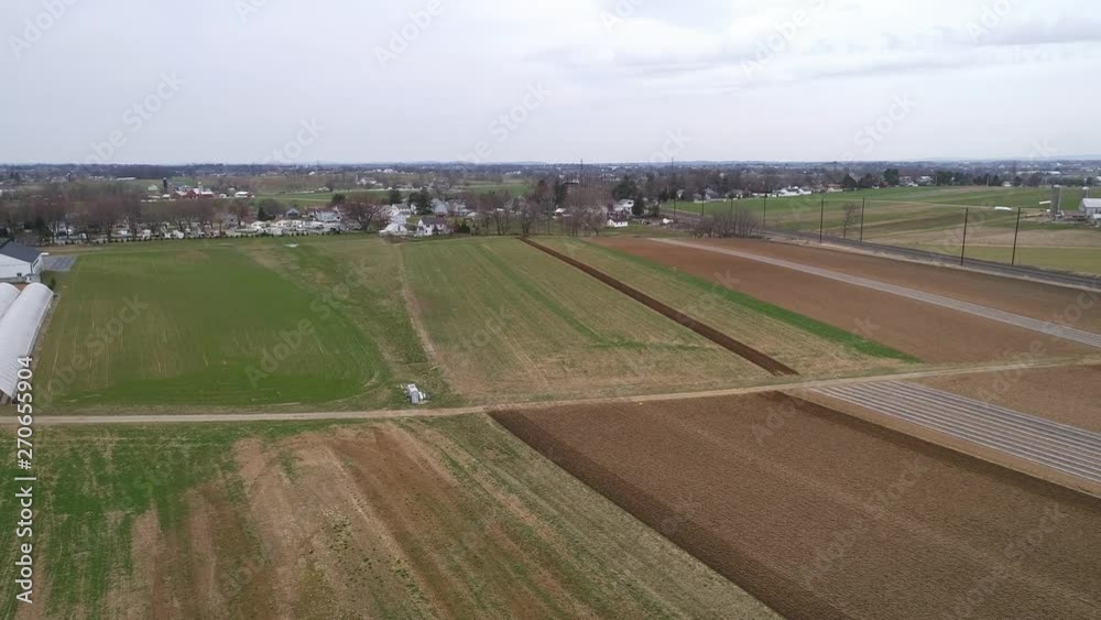 Aerial View of Amish Farm Lands being Ready for a New Growing Season as Seen by a Drone Aerial View of Amish Farm Lands being Ready for a New Growing Season as Seen by a Drone