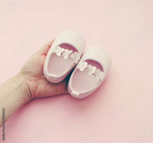 pair of pink baby shoes