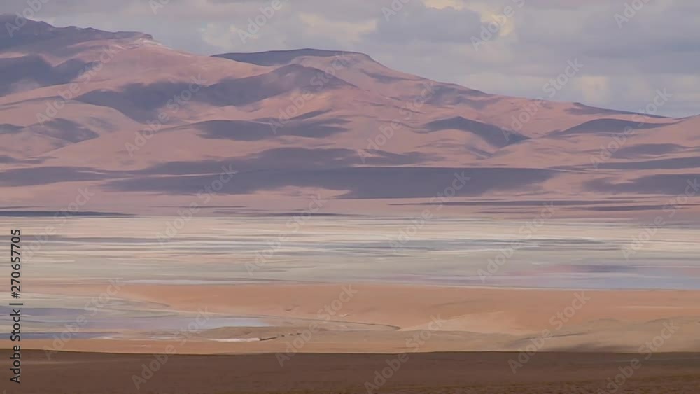 An establishing shot of a mountainous landscape in an area around the andes region in south america An establishing shot of a mountainous landscape in an area around the andes region in south america