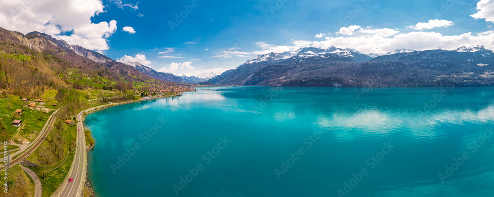 Brienz town on lake Brienz by Interlaken with the Swiss Alps covered by snow in the background, Switzerland, Europe