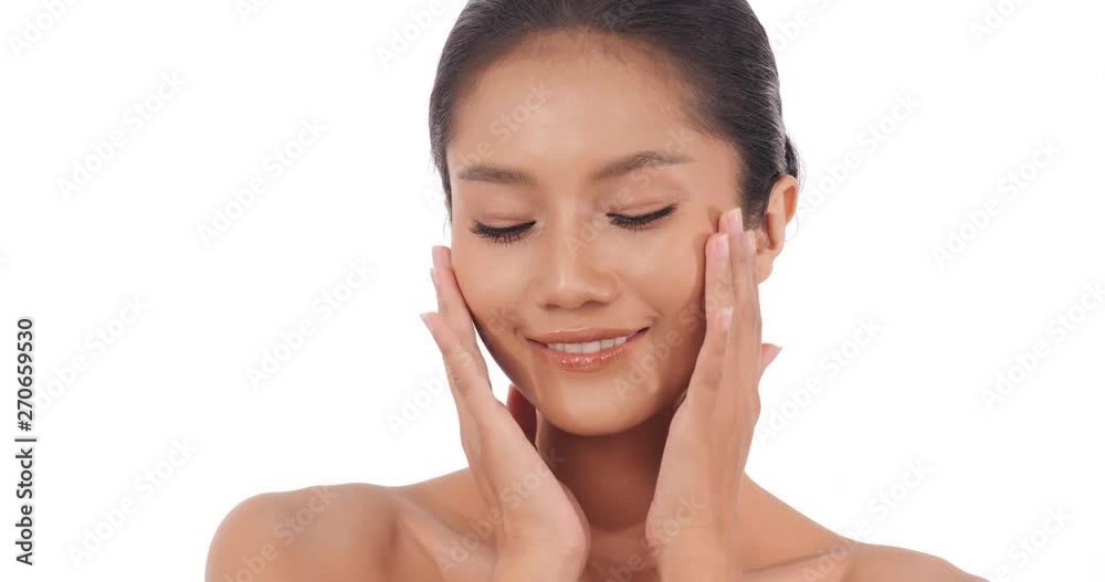 Beautiful asian woman with perfect skin at white background. People with beauty, makeup, health care concept. Beautiful asian woman with perfect skin at white background. People with beauty, makeup, health care concept.