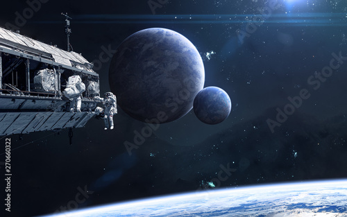 Fototapeta Naklejka Na Ścianę i Meble -  Planets in deep space. Space station, astronauts. Science fiction. Elements of this image furnished by NASA