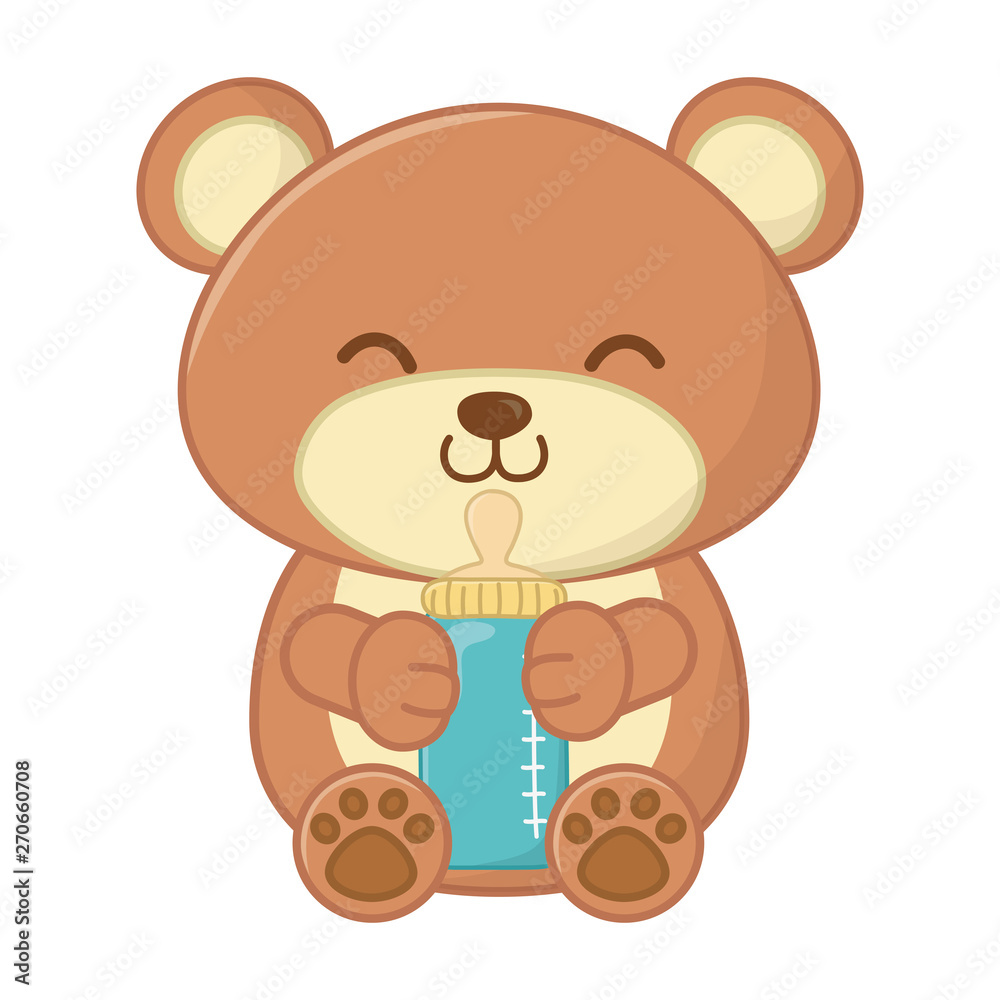 toy bear holding a feeding bottle