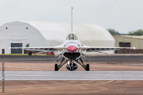 Photography A Thunderbird jet taxis onto the runway