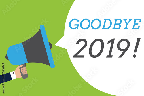 Text sign showing Goodbye 2019. Conceptual photo New Year Eve Milestone Last Month Celebration Transition Man holding megaphone loudspeaker speech bubble message speaking loud photo