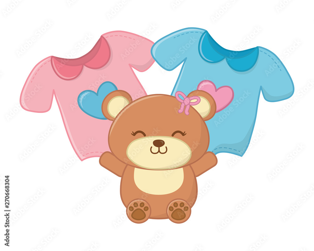 toy bear and baby clothes