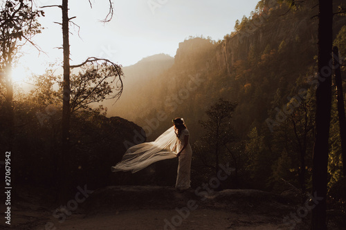 Bride in Nature at Sunset