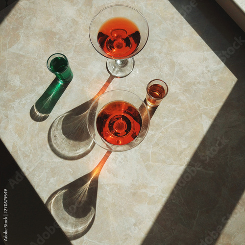 alcohol cocktails with long shadow, top view