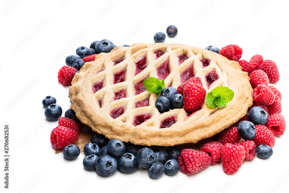 Homemade whole forest fruit tart isolated on white Homemade whole forest fruit tart isolated on white