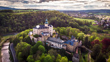 Aerial view of Medieval Gothic and Renaissance style castle on top of the hill in Frydlant, Czech Republic.