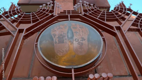 The entrance to the modern temple complex Iskcon, New Delhi, India. Shot in motion photo