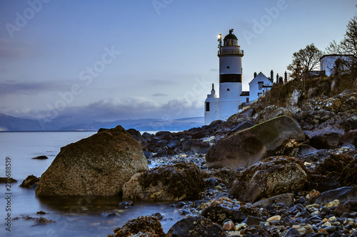 lighthouse on coast of sea