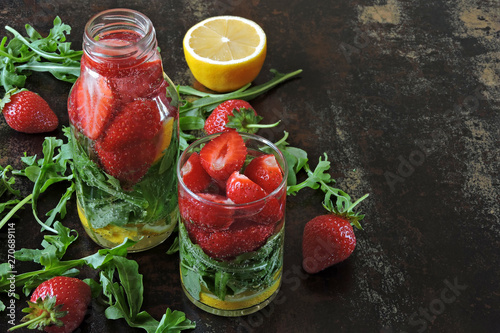 Detox drink with strawberries and arugula. Summer drink in the heat. Fitness drink.