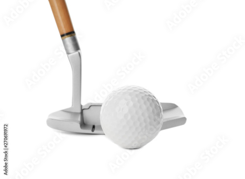 Hitting golf ball with club on white background