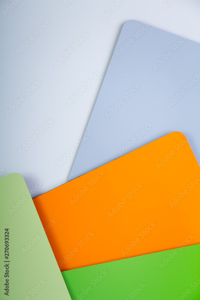 Concept of color cards on white background four colors green, lime, orange, gray isolate on white background Concept of color cards on white background four colors green, lime, orange, gray isolate on white background