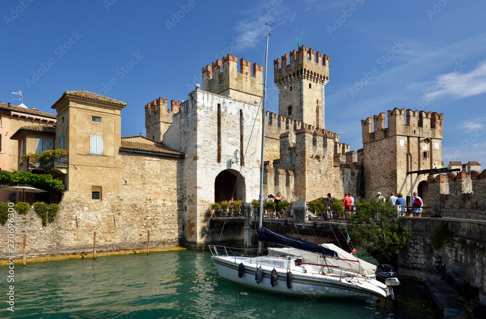 SIRMIONE, ITALY - Scaliger Castle in Sirmione,Lago di Garda in Italy,Old Castle in the Historical town Sirmione on peninsula in Garda lake, Lombardy