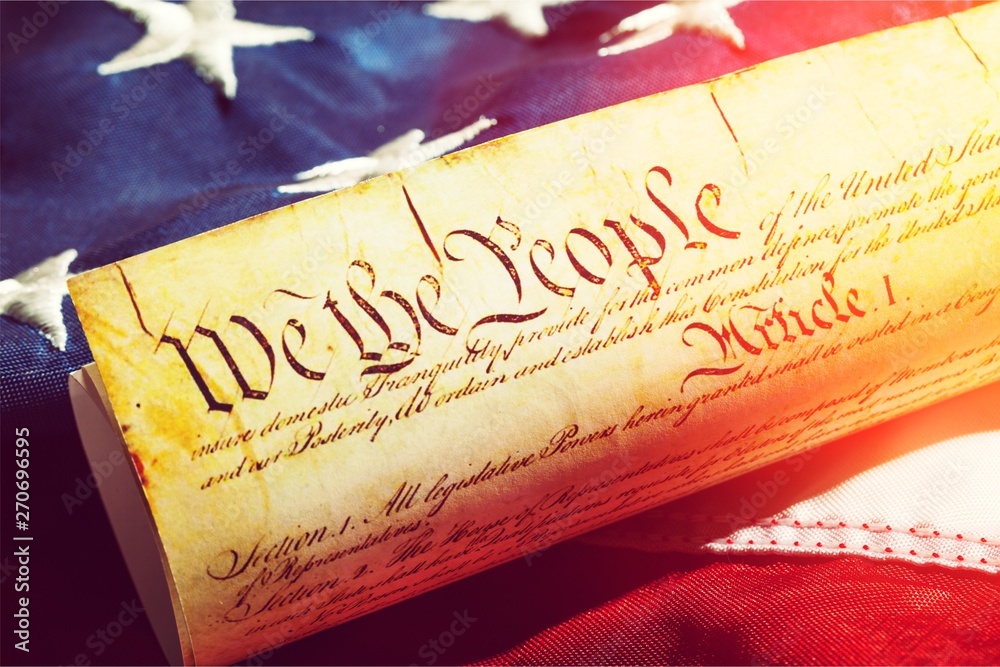 Fototapeta premium Roll of vintage US Constitution, Patriotism, Fourth of July background
