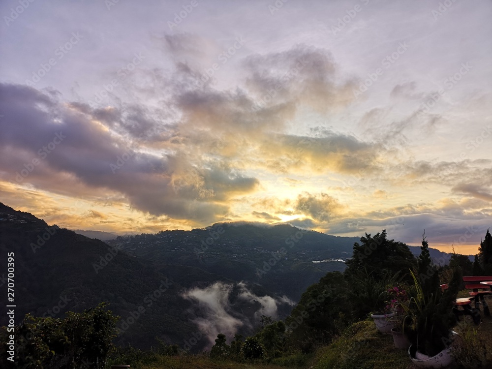 Beautiful sunrise overlooking Mount Kinabalu on a bike journey
