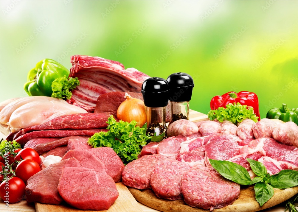 Fresh Raw Meat Background with vegetables Fresh Raw Meat Background with vegetables
