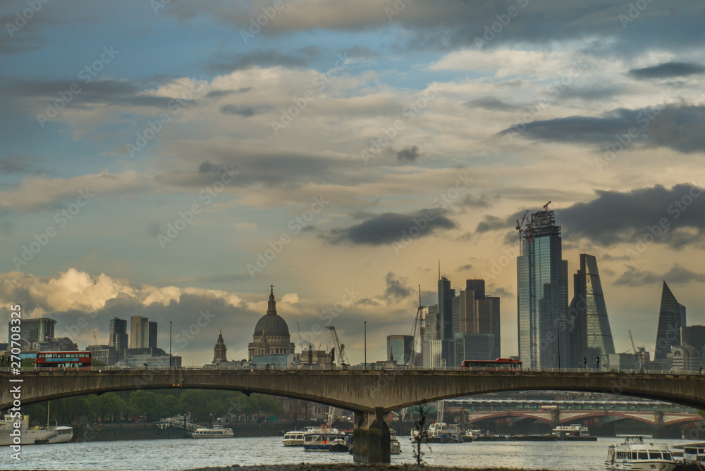London skyscrapers along the River Thames make the city a modern style.