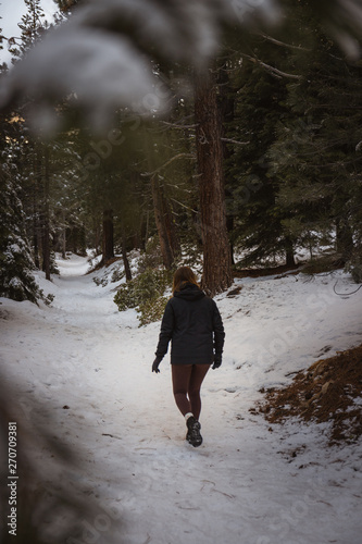 woman walking in forest