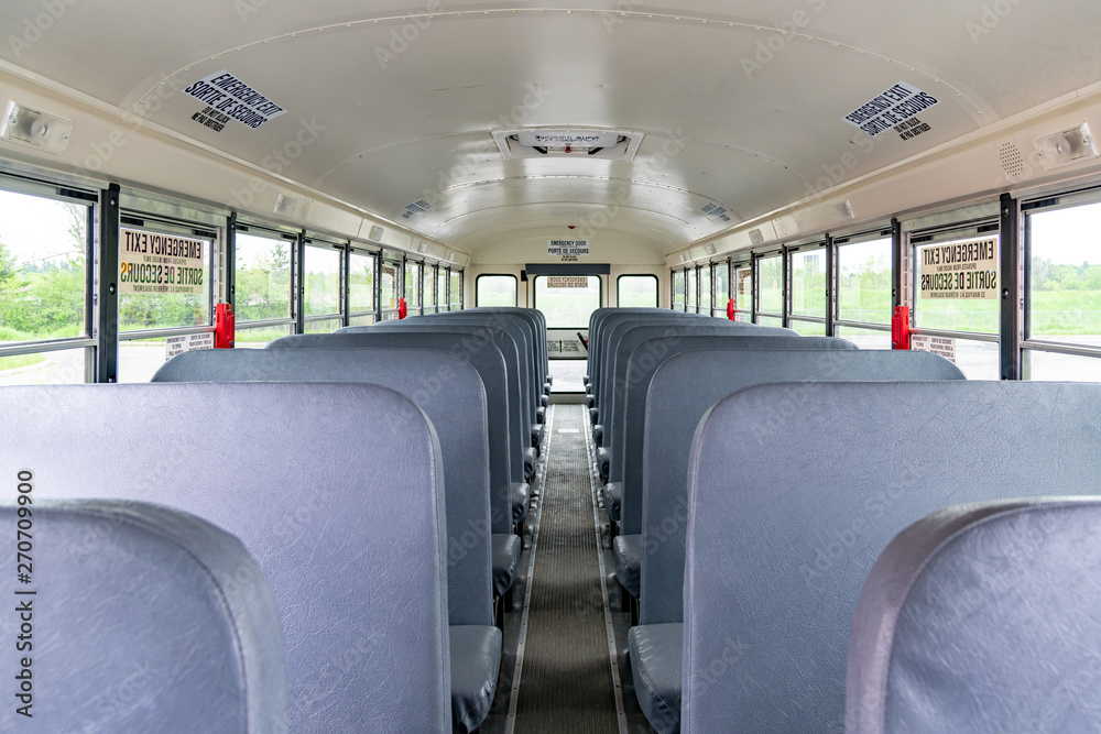 Empty seats inside a school bus